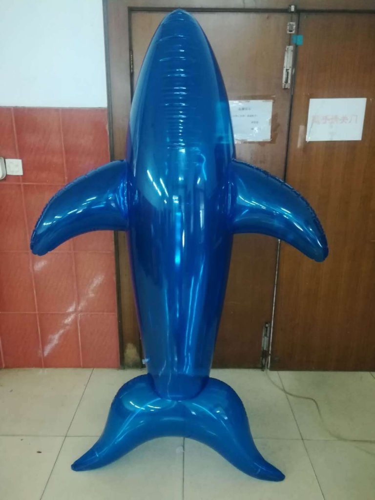 Inflatable whale, inflatable blimp whale, pool toy, blow up toy.