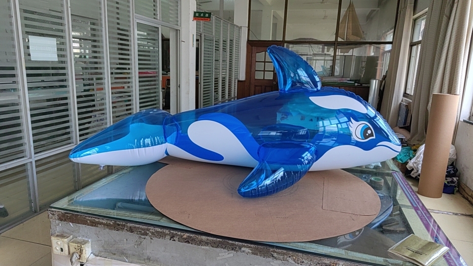 Inflatable whale, inflatable blimp whale, pool toy, blow up toy.
